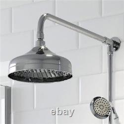 Mélangeur thermostatique de douche traditionnel en chrome avec valve à croix et pommeau rond de pluie.